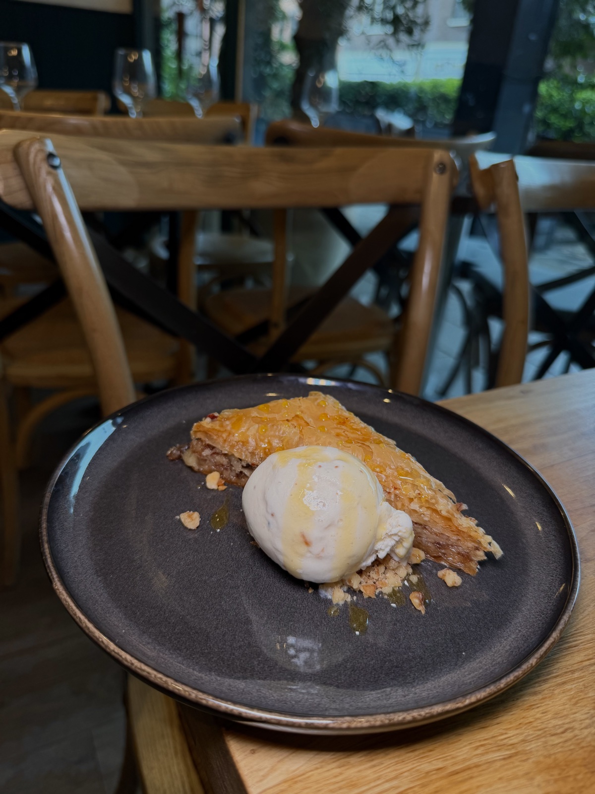 Baklava with vanilla ice cream and honey syrup