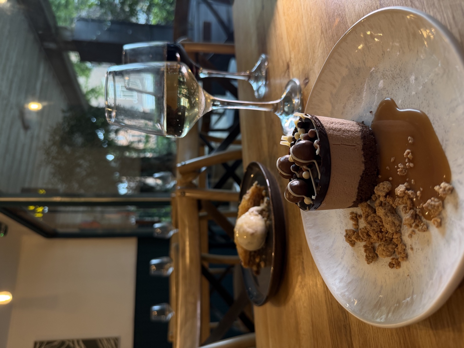 Chocolate mousse and baklava with red and white wine in the evening