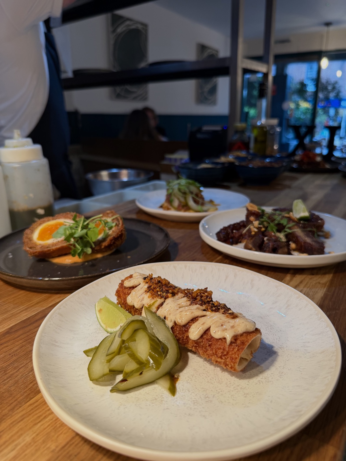 Croquette and scotch egg at the MIXA kitchen pass